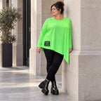 Langarmshirt in frischem Grün mit asymmetrischem Zipfelsaum aus weichem Stretchjersey