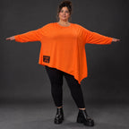 Orange Langarmshirt aus weichem Stretchjersey mit asymmetrischem Schnitt und Zipfelsaum
