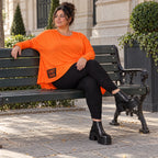 Orange Langarmshirt aus weichem Stretchjersey mit asymmetrischem Schnitt und Zipfelsaum