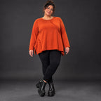 Langarmshirt in Orange mit Rundhalsausschnitt und fließender A-Linie aus Stretchjersey