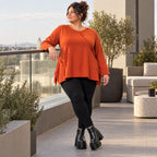 Langarmshirt in Orange mit Rundhalsausschnitt und fließender A-Linie aus Stretchjersey