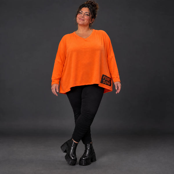 Langarmshirt in kräftigem Orange mit lässig kastigem Schnitt aus weichem Baumwolljersey