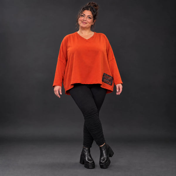 Langarmshirt in Orange aus weichem Stretchjersey mit V-Ausschnitt und kastiger Passform