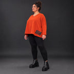 Langarmshirt in Orange aus weichem Stretchjersey mit V-Ausschnitt und kastiger Passform