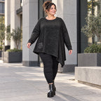Strickshirt in Schwarz/Weiß mit asymmetrischem Zipfelsaum aus weichem Flauschgarn