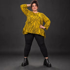 Kuscheliges Langarmshirt aus flauschigem Feinstrick in A-Linie mit Gelb/Schwarz Muster