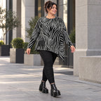 Flauschiges Feinstrickshirt mit Zebramuster in Schwarz/Weiß und asymmetrischem Zipfelsaum