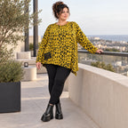 Kuscheliges Feinstrickshirt in Gelb/Schwarz aus flauschigem Garn mit asymmetrischem Saum