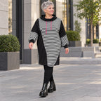 Gestreiftes Winterkleid aus Stretchjersey in Schwarz/Weiß/Pink mit Rollkragen und Kapuze