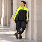 Lässiger Überwurf in leuchtendem Neongelb aus weichem Stretchjersey mit warmer Kapuze