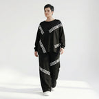 Schwarzer Oversize Zweiteiler mit weißem Streifenprint aus weichem FrenchTerry Loungewear