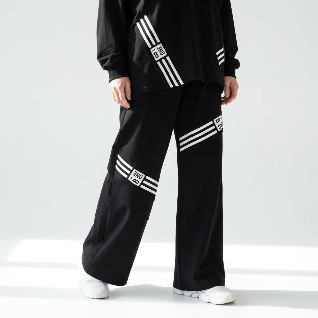 Schwarzer Oversize Zweiteiler mit weißem Streifenprint aus weichem FrenchTerry Loungewear