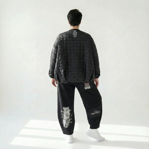 Oversize Steppjacke in tiefschwarz aus Baumwollmix mit Ballonschnitt und Fronttaschen