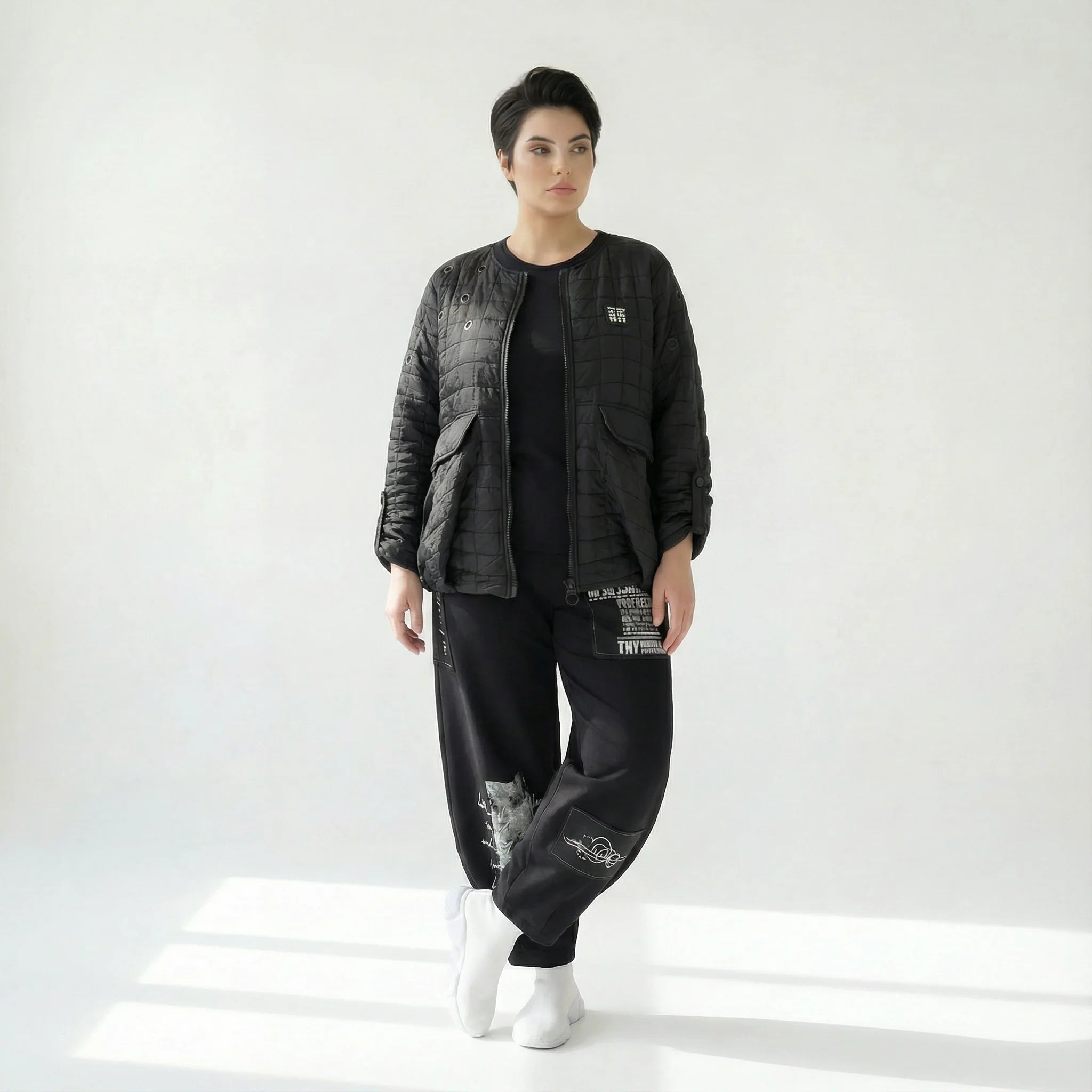 Oversize Steppjacke in tiefschwarz aus Baumwollmix mit Ballonschnitt und Fronttaschen