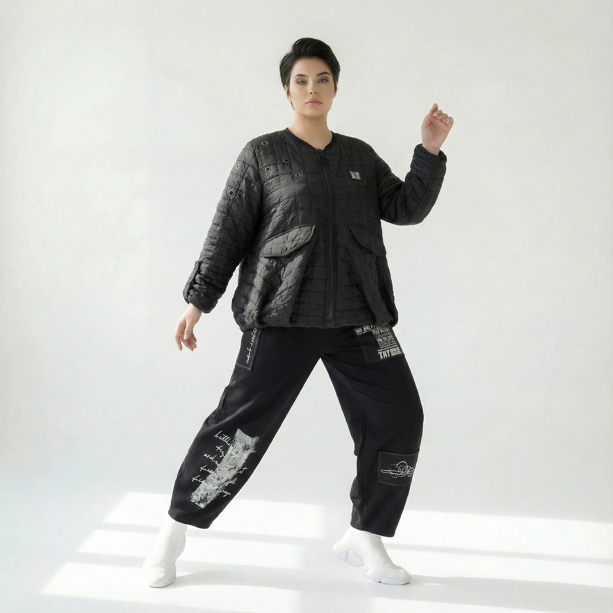 Oversize Steppjacke in tiefschwarz aus Baumwollmix mit Ballonschnitt und Fronttaschen