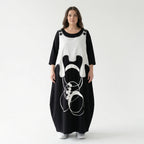 Schwarzes Oversizekleid mit weißem Grafikprint Layerlook Rundhals aus Viskosestretch
