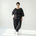 Schwarze Oversizebluse A-Formschnitt aus FrenchTerry mit abstraktem Streifenmuster 34Arm
