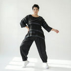 Schwarze Oversizebluse A-Formschnitt aus FrenchTerry mit abstraktem Streifenmuster 34Arm