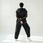 Schwarzes Meshshirt Set mit transparenter Tülloptik und voluminöser weiter Slinkyweste