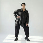 Schwarze Oversize Lederimitatjacke mit Umlegekragen und Zippertaschen urban glänzend
