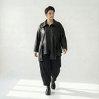 Schwarze Oversize Lederimitatjacke mit Umlegekragen und Zippertaschen urban glänzend