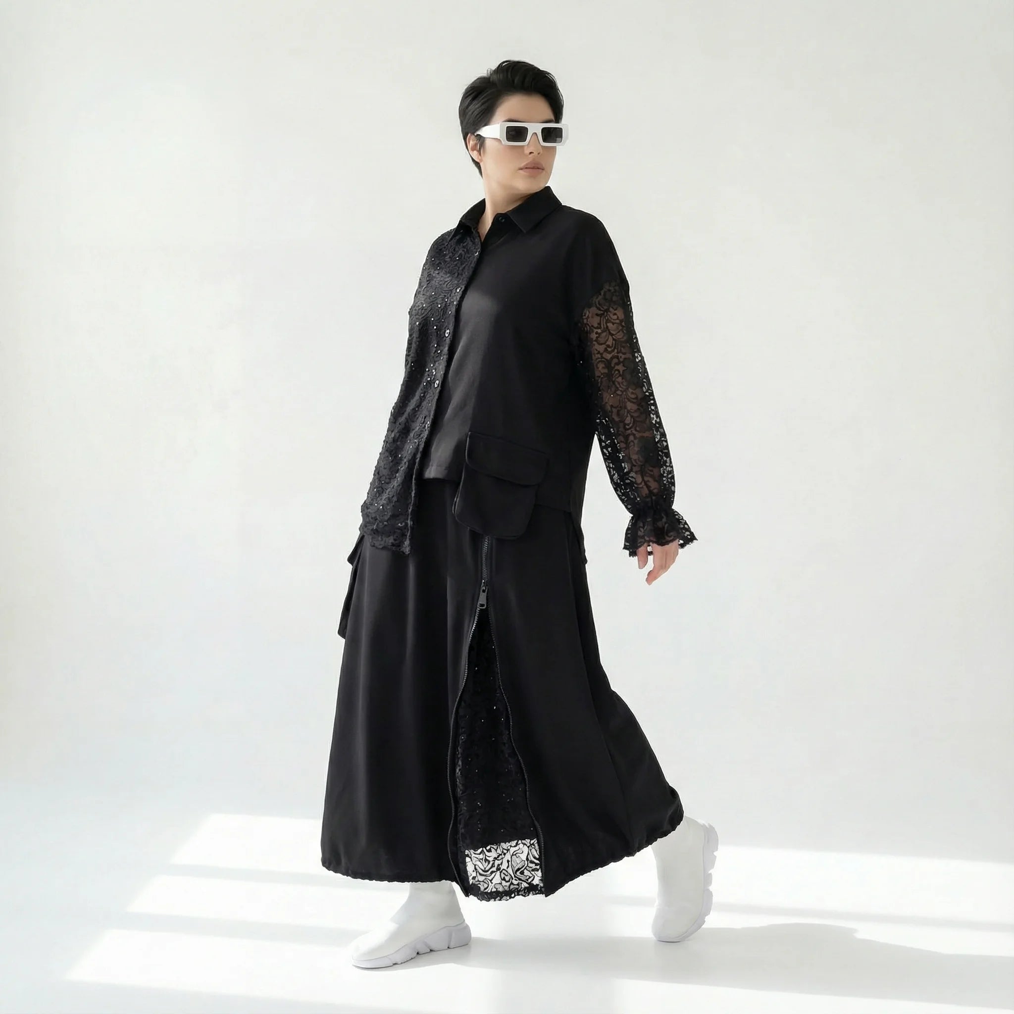 MODEARE - Zweiteiliges Oversize-Set mit Spitze: Schwarze Bluse & weiter Rock in Lagenoptik