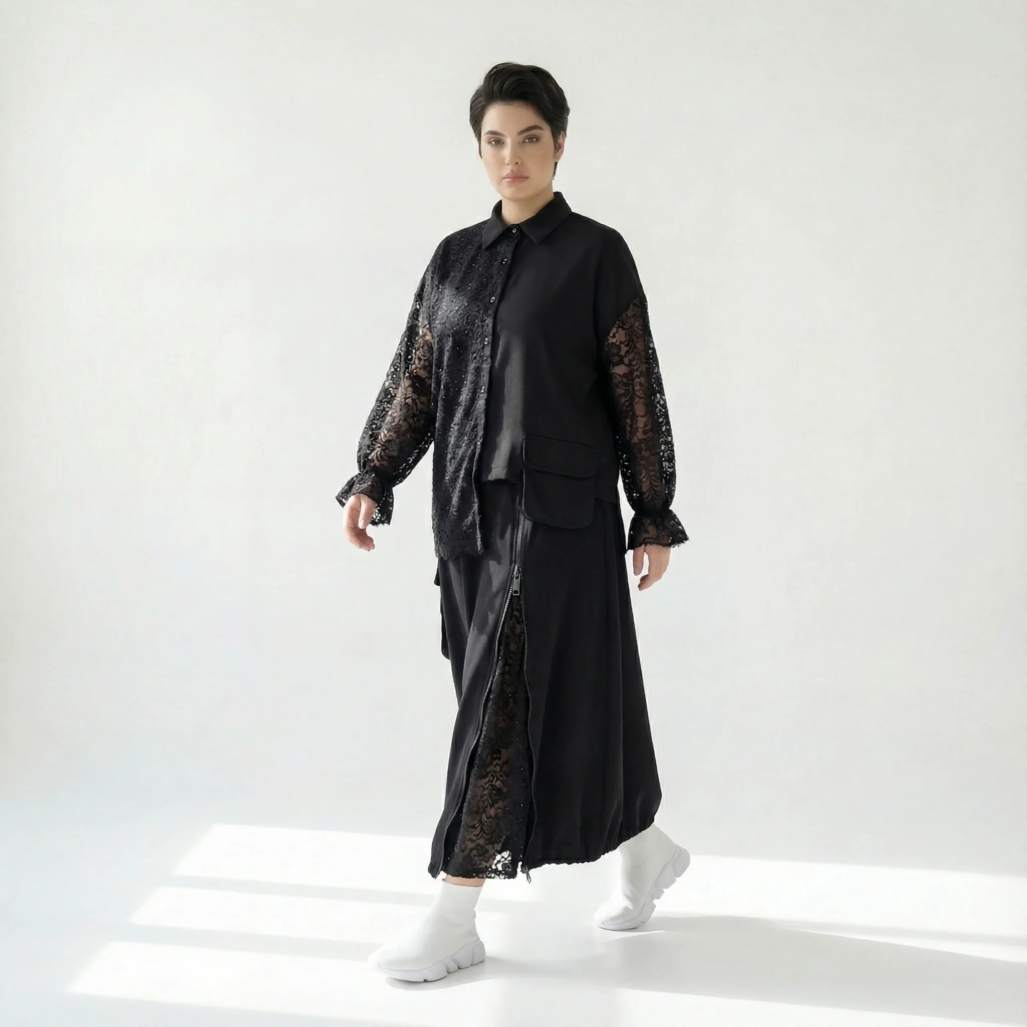 MODEARE - Zweiteiliges Oversize-Set mit Spitze: Schwarze Bluse & weiter Rock in Lagenoptik