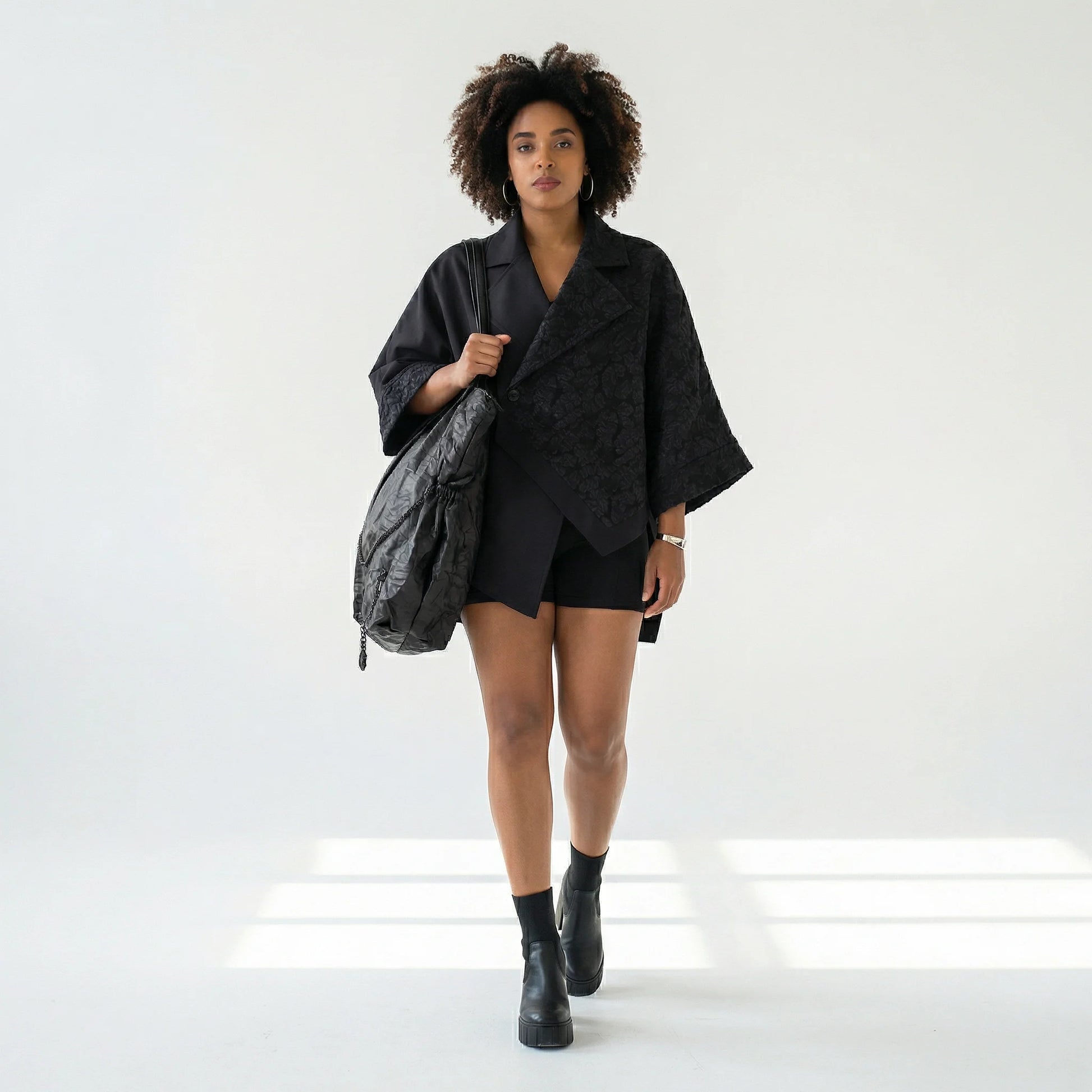 Ausgefallene schwarze Designer Handtasche in Crash Optik aus Lederimitat H4 Fashion bei Modeare