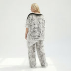 Schwarzweißes Jersey Set mit asymmetrischem Oversizeshirt und weiter Alloverprinthose