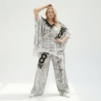 Schwarzweißes Jersey Set mit asymmetrischem Oversizeshirt und weiter Alloverprinthose