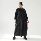 Schwarzes Zweiteiler Maxikleid im Lagenlook mit asymmetrischem Oberkleid und Taschen