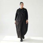 Schwarzes Zweiteiler Maxikleid im Lagenlook mit asymmetrischem Oberkleid und Taschen