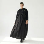 Schwarzes Zweiteiler Maxikleid im Lagenlook mit asymmetrischem Oberkleid und Taschen