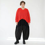 Oversize Strick Überwurf Orange V-Ausschnitt Destroyed Look AKH Premium bei Modeare kaufen für Damen im Lagenlook