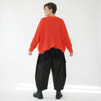 Oversize Strick Überwurf Orange V-Ausschnitt Destroyed Look AKH Premium bei Modeare kaufen für Damen im Lagenlook