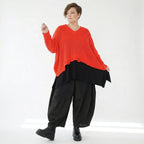 Oversize Strick Überwurf Orange V-Ausschnitt Destroyed Look AKH Premium bei Modeare kaufen für Damen im Lagenlook