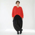 Oversize Strick Überwurf Orange V-Ausschnitt Destroyed Look AKH Premium bei Modeare kaufen für Damen im Lagenlook