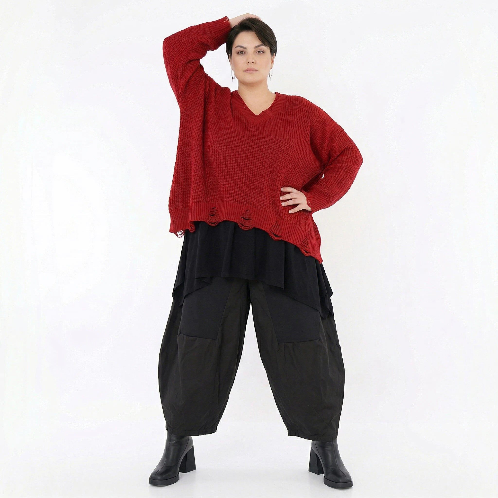 Oversize Strick Überwurf in Rot mit V-Ausschnitt und Destroyed Saum