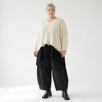 Kastiger Strick Überwurf in Naturweiß aus Baumwolle Acryl Mix von AKH Premium bei Modeare Oversize Look für Damen