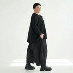 Oversize Strickshirt Schwarz Lagenlook Baumwolle AKH Premium bei Modeare Avantgarde Damenmode mit Blume und Destroyed Details