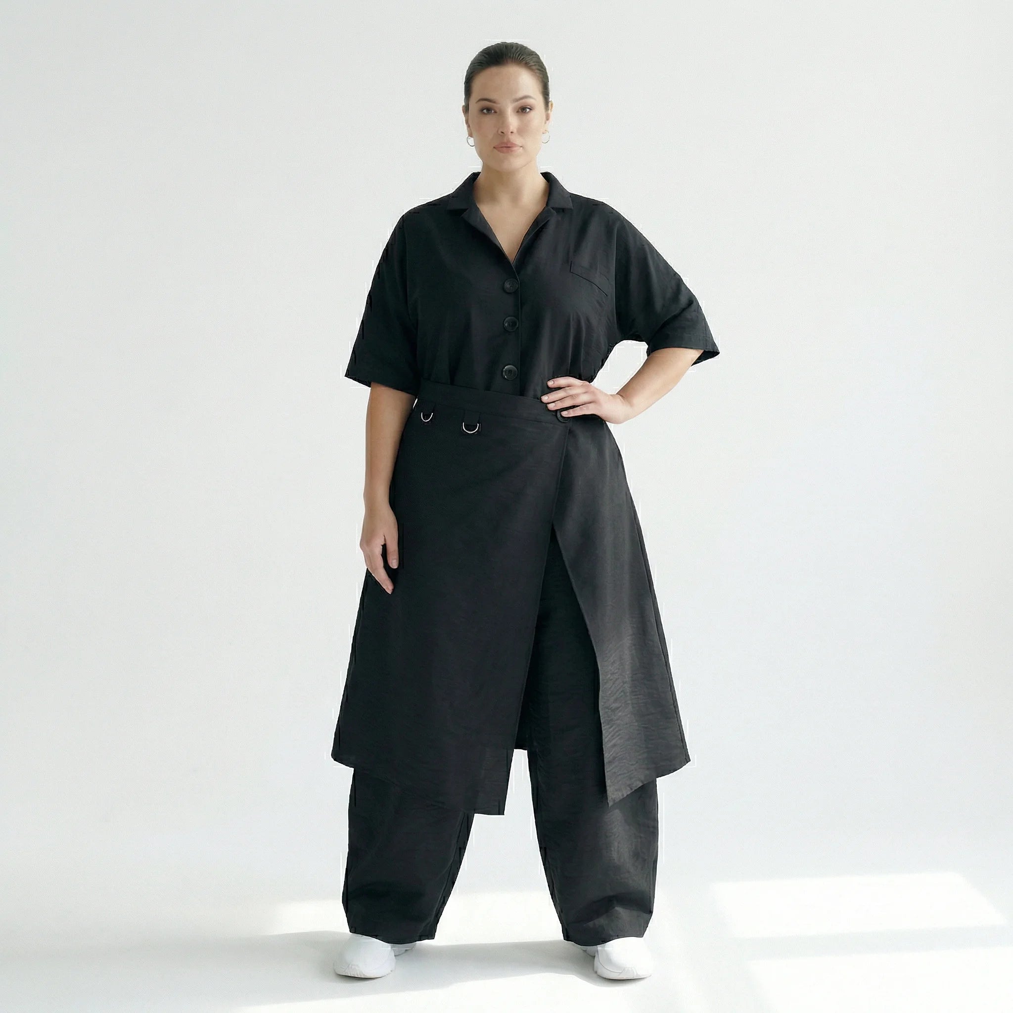 Cadrelli Avantgarde Jumpsuit in Schwarz mit Crash-Struktur und Oversize-Silhouette