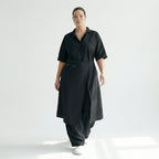 Schwarzer Crashjumpsuit Oversize aus Viskose mit weitem Bein Reverskragen und Taschen