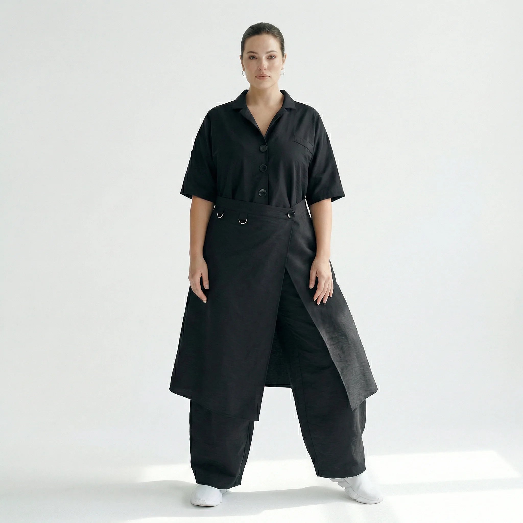 Cadrelli Avantgarde Jumpsuit in Schwarz mit Crash-Struktur und Oversize-Silhouette