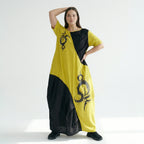 Oversize Maxikleid in Sonnengelb Schwarz mit Pinselstrichprint asymmetrisch aus Jersey