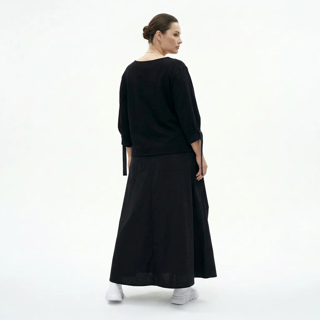 Statement-Kleid in Inkshadow-Schwarz mit Utility-Details und stilvoller Oversize-Silhouette