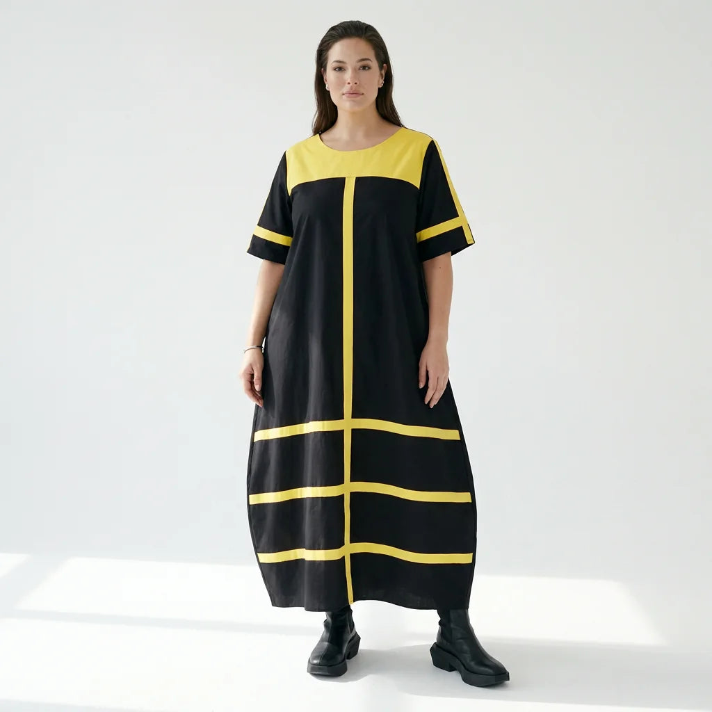 Avantgarde Maxikleid Cadrelli schwarz mit gelben Kontraststreifen aus Viskose-Lycra
