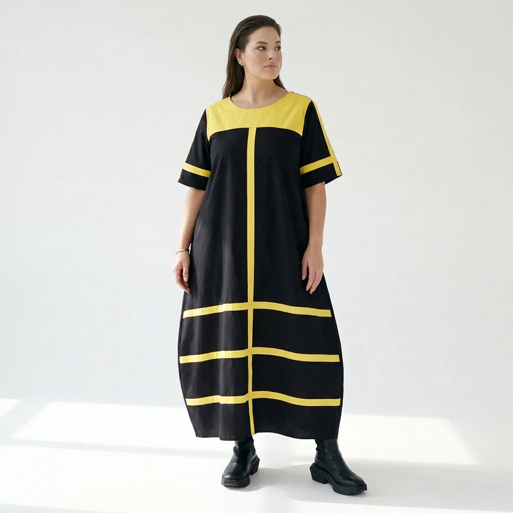 Avantgarde Maxikleid Cadrelli schwarz mit gelben Kontraststreifen aus Viskose-Lycra