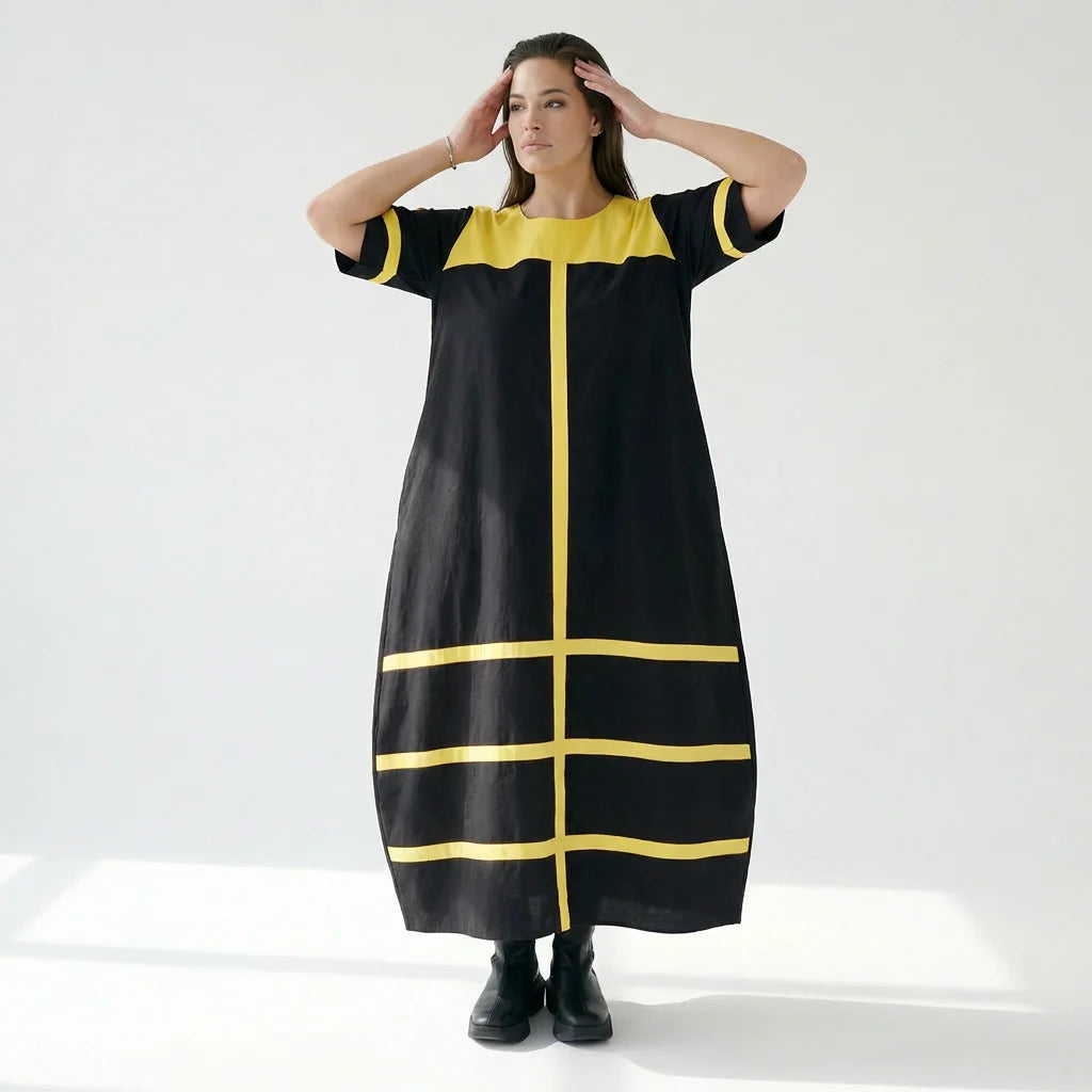 Avantgarde Maxikleid Cadrelli schwarz mit gelben Kontraststreifen aus Viskose-Lycra