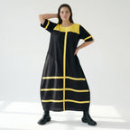 Schwarzgelbes Maxikleid mit Kontraststreifen aus Viskose Popeline locker weit in A-Linie