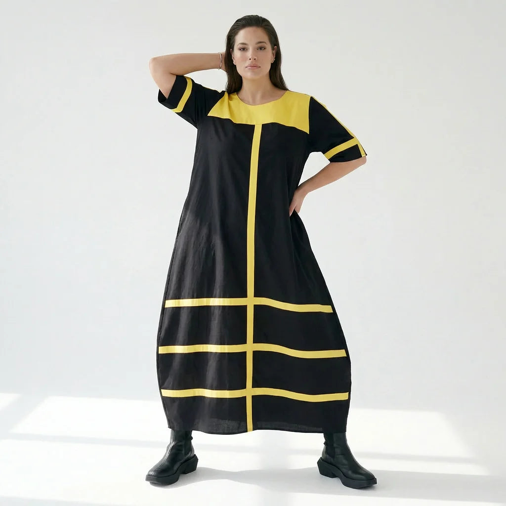 Avantgarde Maxikleid Cadrelli schwarz mit gelben Kontraststreifen aus Viskose-Lycra